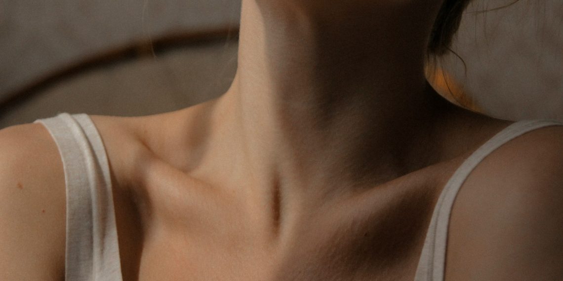 woman in white tank top