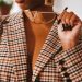woman in white and black checkered button up shirt